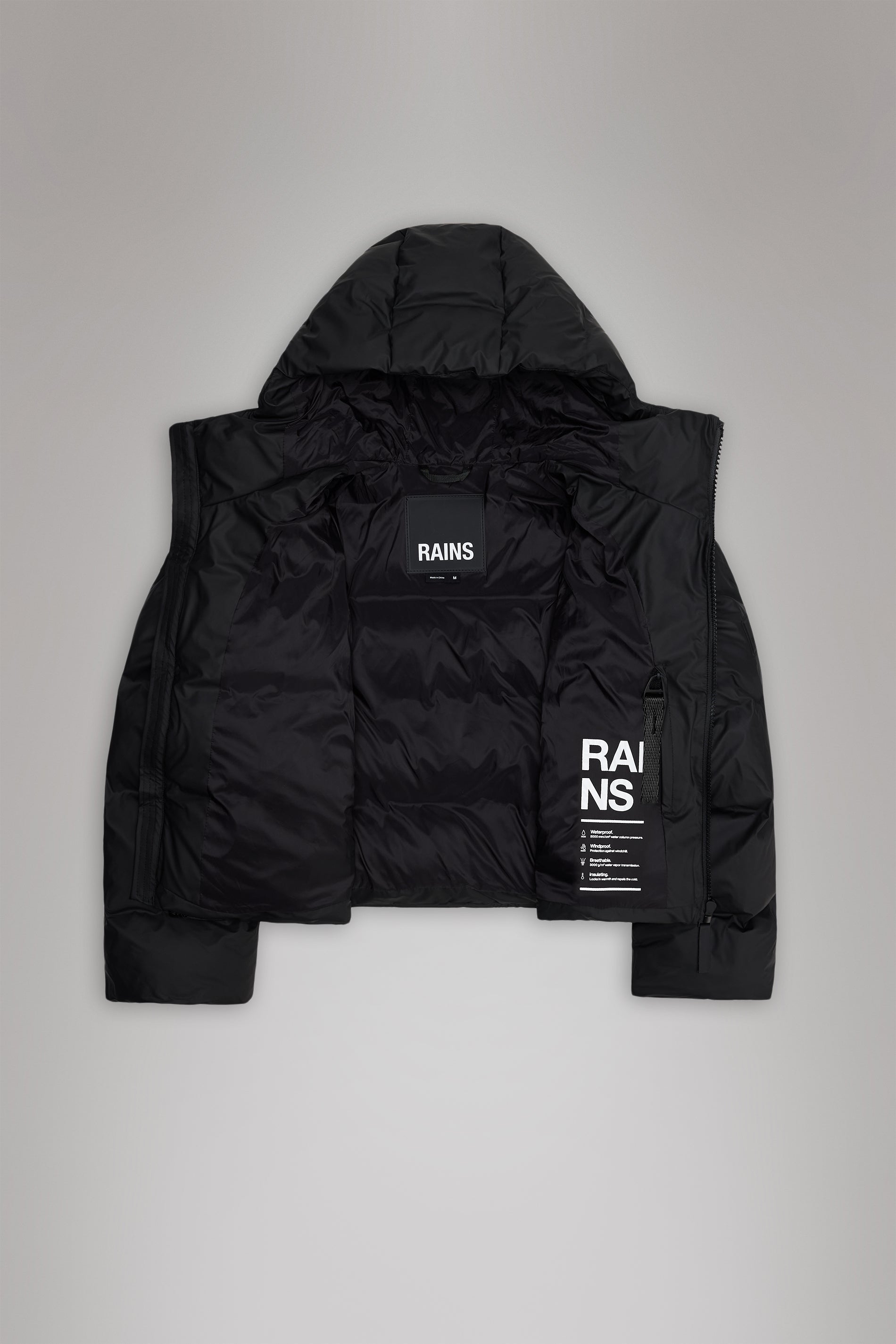 Rains® Alta Short Puffer Jacket in Black for €329 | 2-Year